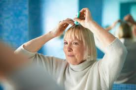 Senior woman hair loss doctor