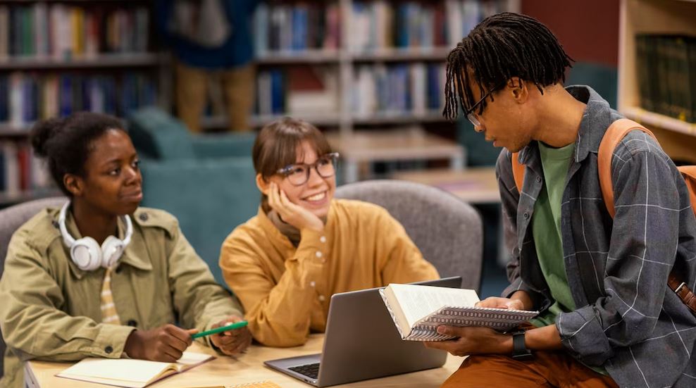 colleagues studying in the university library