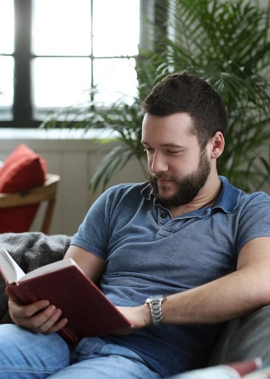 man reading a book