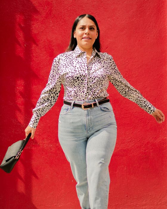 Woman Posing on Red Background