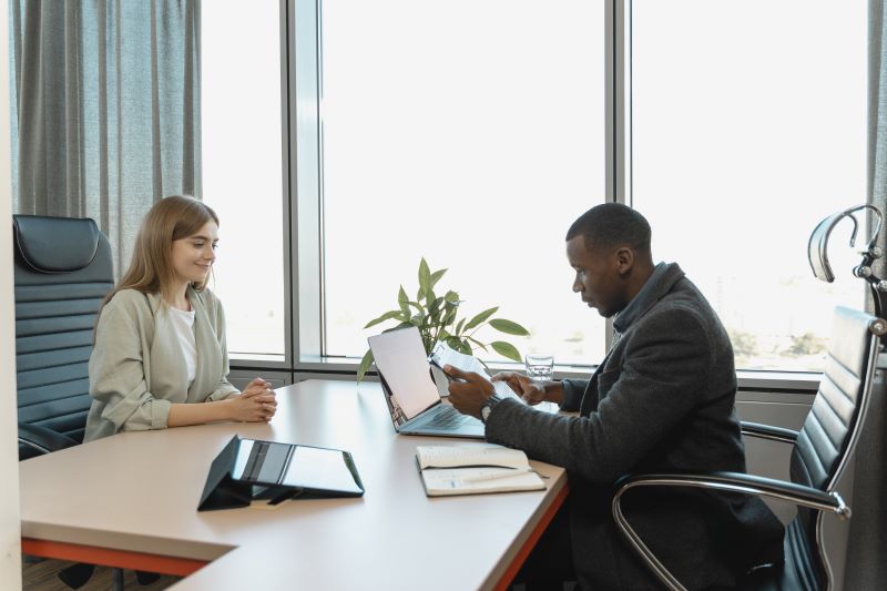 Man Interviewing Woman