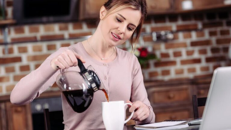 woman pouring coffee