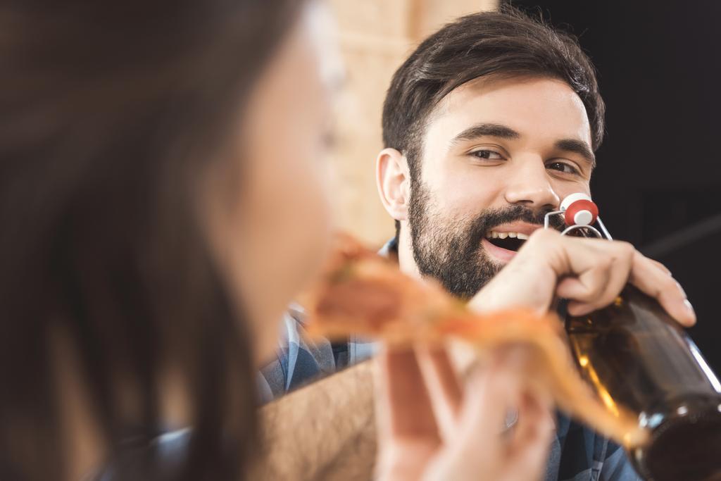 young man drinking beer