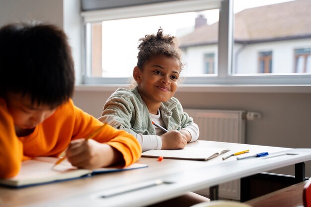 Students learning at school in their classroom