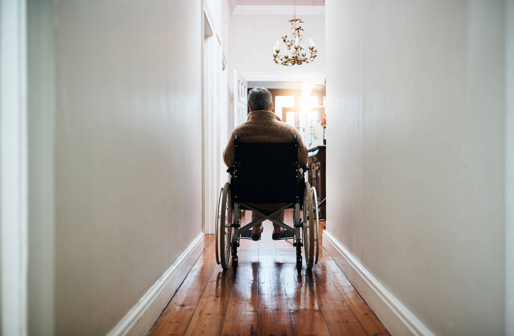  senior woman sitting in her wheelchair