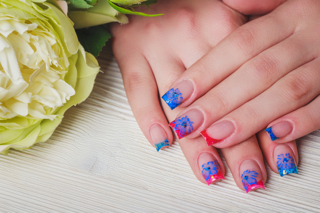 nail art in blue and red colors