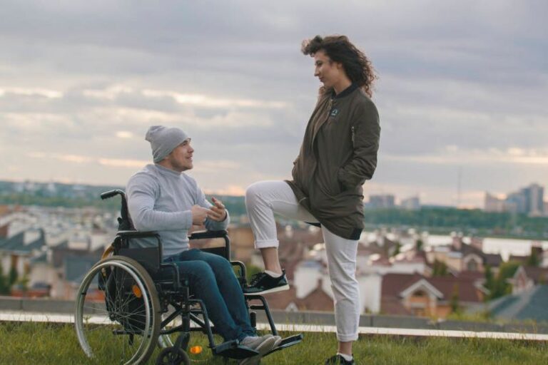 woman with young disabled man