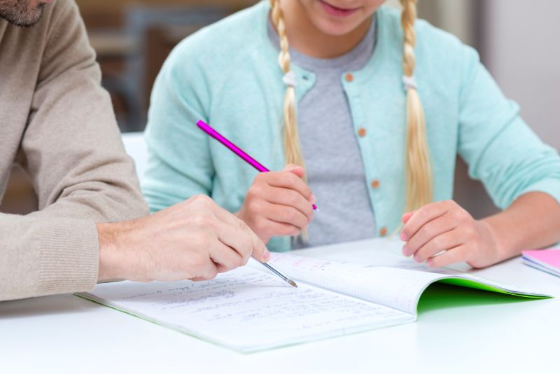 Ontario IEP Testing: Helping Students Succeed Young student in Ontario focused on homework, representing the potential unlocked by Ontario IEP testing.