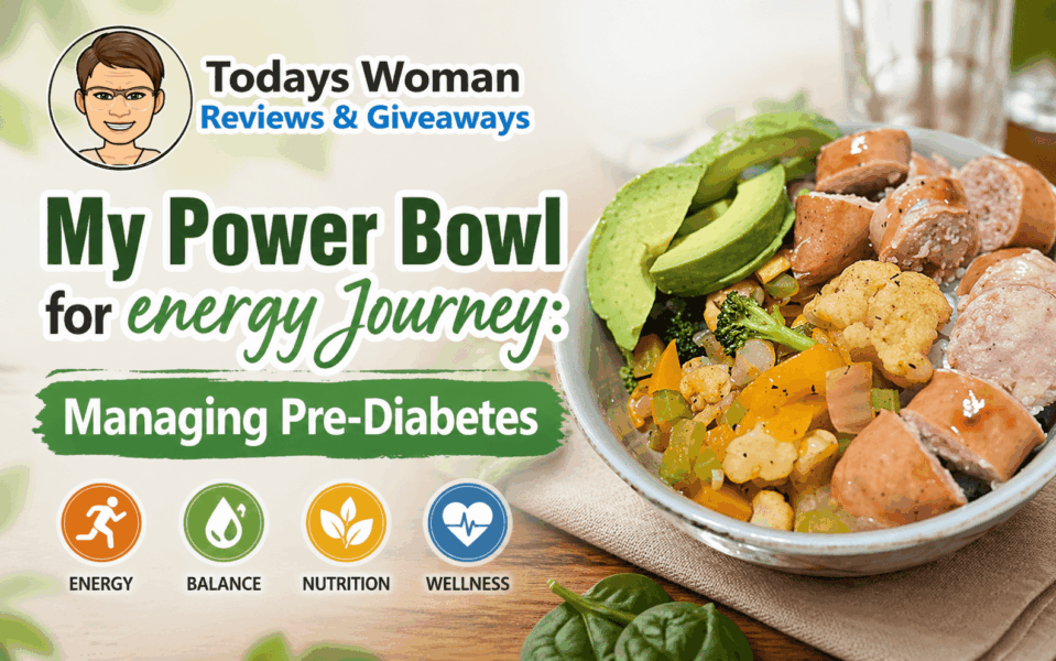 A white ceramic bowl filled with sliced roasted sausages, fresh avocado slices, and a medley of roasted vegetables including broccoli, cauliflower, and yellow peppers.