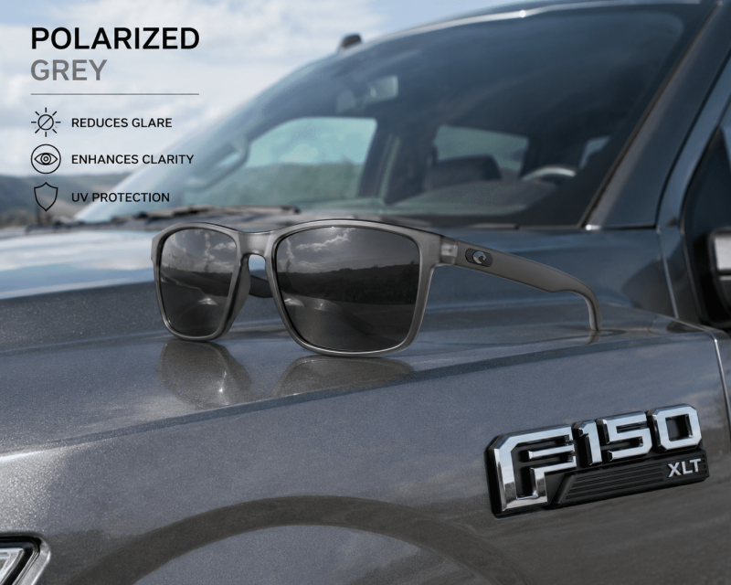 Polarized sunglasses in grey on a f150 Best Sunglasses for Driving: Reduce Glare and Drive Safer