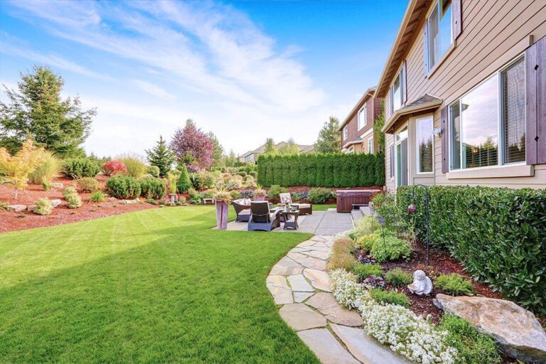 Well-maintained backyard garden with healthy plants and tidy landscaping