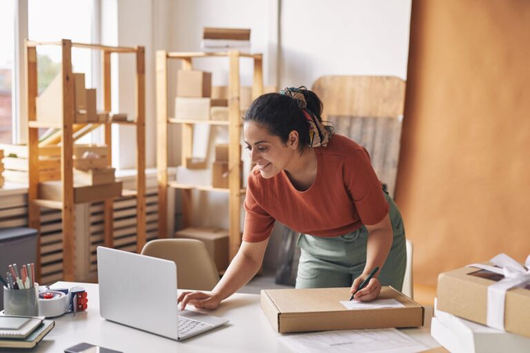 Woman working on her side hustle from a home office